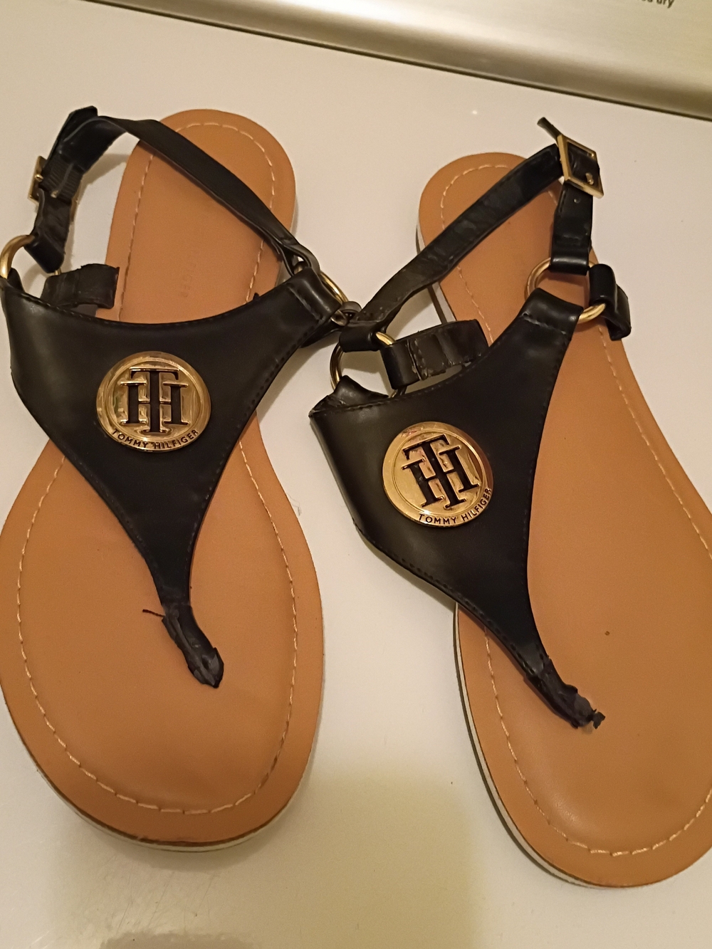 Tommy Hilfiger Black Leather Thong Sandals with Gold Emblem